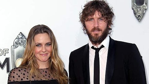 Christopher Jarecki and Alicia Silverstone (AP Photo)