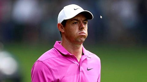 Northern Ireland's Rory McIlroy appears dejected on the third fairway on day four of the PGA Championship at Wentworth Golf Club, England. | AP
