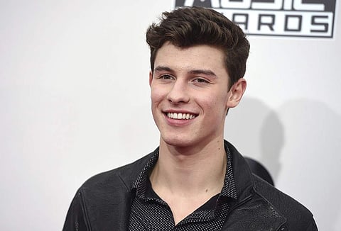 Singer-songwriter Shawn Mendes poses for a photograph on the red carpet. (Photo | AP)