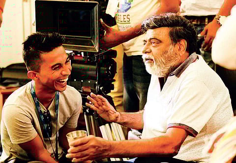 Director Gurudatha Ganiga and Ambareesh on the sets of Ambi Ning Vayassaytho.