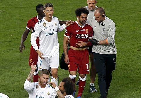 Liverpool's Mohamed Salah leaves after injuring himself during the Champions League Final against Real Madrid (File Photo | AP)