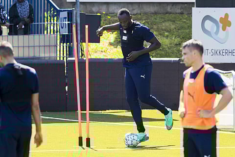 Usain Bolt participates in a football training session with the Norwegian soccer club Stromsgodset | AP
