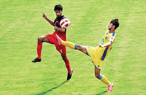 Kerala Blasters FC Reserves and Cochin Port Trust players in action during Kerala Premier League match at the Panampilly Nagar Sports Complex in Kochi on Wednesday | MELTON ANTONY