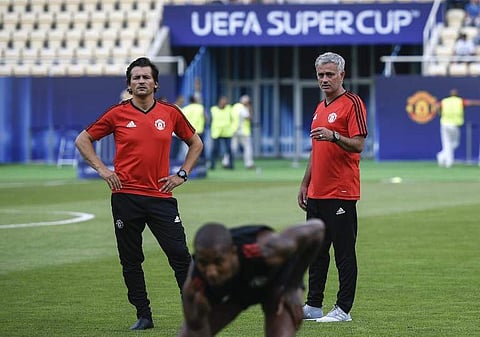 Manchester United's Portuguese manager Jose Mourinho (R) and his assistant Rui Filipe da Cunha Faria (File | AFP)
