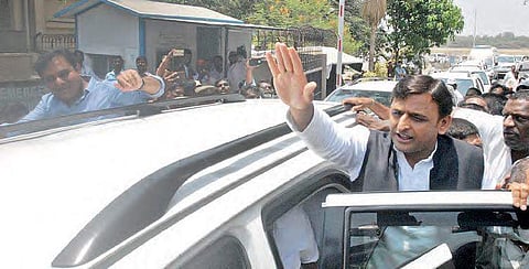 Samajwadi Party leader and former UP Chief Minister Akhilesh Yadav arrives to the cheers of supporters at Begumpet Airport. | Express
