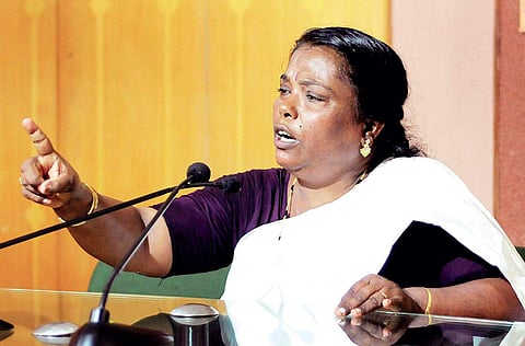 Rajeshwari, whose daughter was raped and murdered at her house two years ago, speaking to reporters in Kochi on Friday | A SANESH