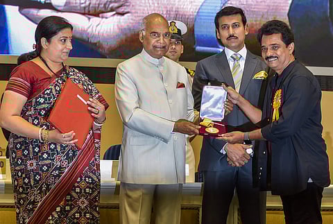 Over 70 artistes, in an open letter had said, that they were skipping the ceremony as they 'felt dejected rather than honoured'. In this image, director Jayaraj receives Best Direction award from President Ram Nath Kovind. (PTI Photo)