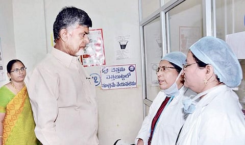 Chief Minister N Chandrababu Naidu interacts with government hospital doctors treating the minor who was raped in Dachepalli, in Guntur on Saturday | express