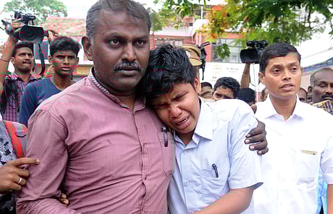 Tamil Nadu NEET aspirant Kasthuri Mahalingam mourning his father's loss (Express Photo)