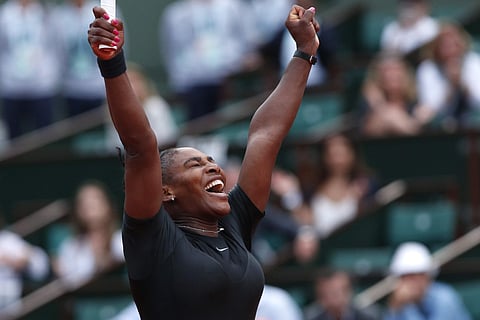 Serena Williams of the U.S. celebrates winning her second round match of the French Open tennis tournament against Australia's Ashleigh Barty in three sets, 3-6, 6-3, 6-4, at the Roland Garros stadium in Paris, France, Thursday, May 31, 2018. (AP Photo)