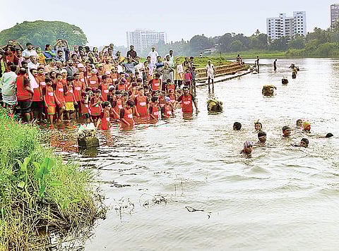 The kids all set to cross the Periyar river