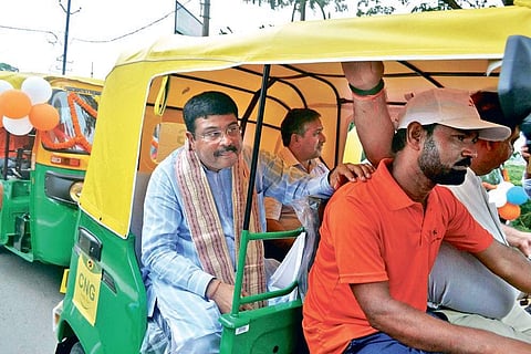 Dharmendra Pradhan takes an auto ride after inaugurating CNG station in Cuttack | rashmi ranjan mohapatra