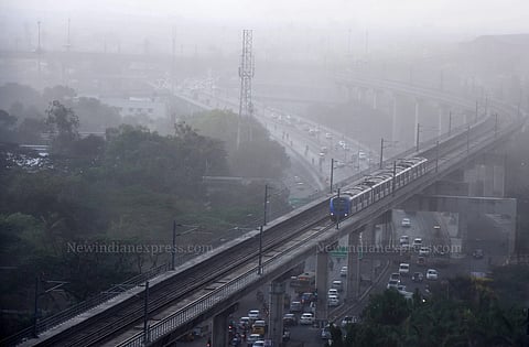 City turned hazy after dust storm,but overcast skies and rain brought some much-needed relief to Chennaites. (EPS |Ashwin Prasath)