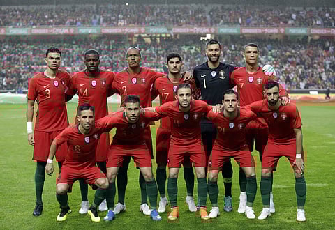 Players are, from left to right, back row, Pepe, William Carvalho, Bruno Alves, Goncalo Guedes, goalkeeper Rui Patricio and team captain Cristiano Ronaldo. And on front row, Joao Moutinho, Raphael Guerreiro, Bernardo Silva, Cedric Soares and Bruno Fernand