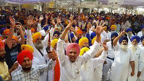 People gathered at Akal Takht in Golden Temple complex.