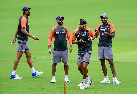 Indian cricketers Cheteshwar Pujara, Dinesh Karthik, K L Rahul and Umesh Yadav at a fielding drill during a practice session ahead of the maiden Test match against Afghanistan in Bengaluru on Tuesday June 12 2018. | PTI