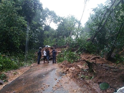 Landslides bring traffic at Charmady Ghat to a grinding halt. (EPS)