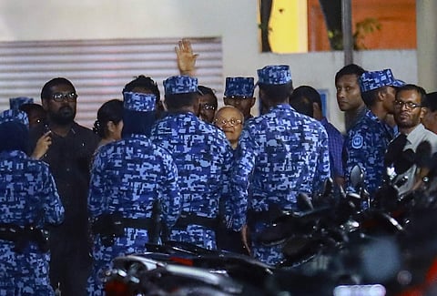 Policemen arrest former Maldives president and opposition leader Maumoon Abdul Gayoom.(Photo | AP)