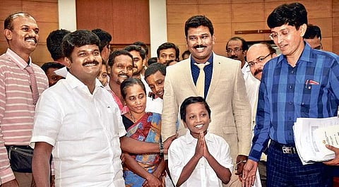 Health minister C Vijaya Baskar and health secretary J Radhakrishnan with M Praveen Kumar, who underwent first paediatric heart transplant at government super speciality hospital recently. The entire doctor team was present | D Sampathkumar