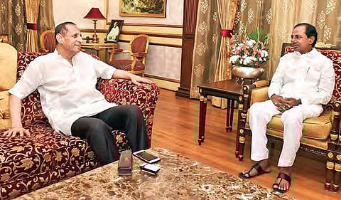 Chief Minister K Chandrasekhar Rao with Governor ESL Narasimhan at Raj Bhavan in Hyderabad on Wednesday | Express