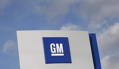 The GM logo is seen at the General Motors Warren Transmission Operations Plant in Warren. (Photo | Reuters)
