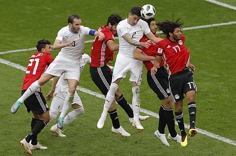 Uruguay's Jose Gimenez heads the ball to score the opening goal during the group A match between Egypt and Uruguay at the 2018 soccer World Cup. (Photo | AP)