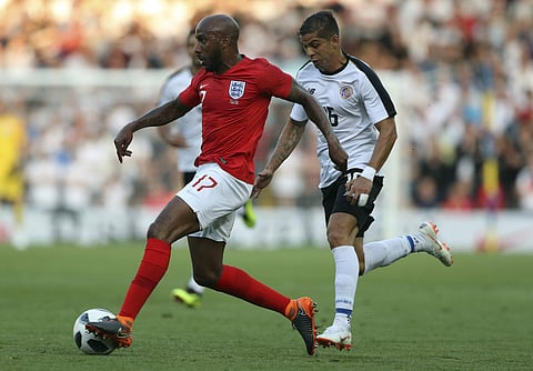 England's Fabian Delph, left, vies for the ball with Costa Rica's Christian Gamboa, right, during the international friendly soccer match between England and Costa Rica at Elland Road stadium in Leeds, England, Thursday, June 7, 2018. | AP