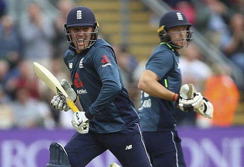 Jason Roy, left, celebrates after reaching his century with Jos Buttler during the One Day International match at the SSE SWALEC Stadium, Cardiff. | AP