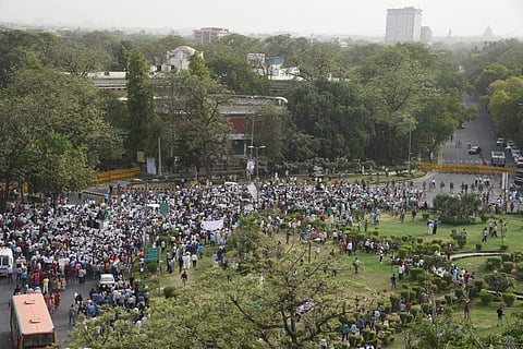 Large number of AAP supporters seen gathering for the silent March from Mandi house to pm house in New Delhi on Sunday. Photo  by Parveen Negi