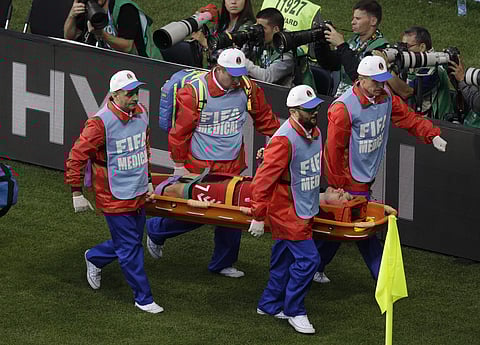 Denmark's William Kvist is carried by medical team during the group C match against Peru at the FIFA World Cup 2018 in the Mordovia Arena in Saransk. | AP