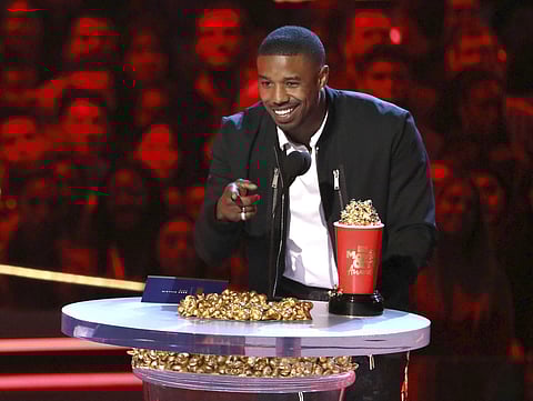 In this Saturday, June 16, 2018, photo, Michael B. Jordan accepts the best villain award for 'Black Panther' at the MTV Movie and TV Awards. (AP)