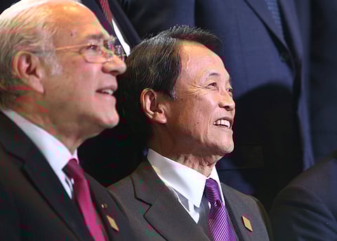 Japan's Minister of Finance Taro Aso poses for an official photo at the G7 Finance Ministers Summit in Whistler, British Columbia, Canada, June 1, 2018. | Reuters