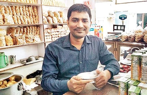 Hriday Deka, a beneficiary of Pradhan Mantri Mudra Yojana, at his shop | Express
