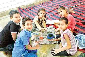 kids make art out of waste under the aegis of Kala Drishti