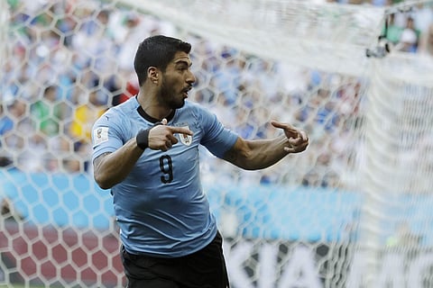 Uruguay's Luis Suarez celebrates scoring his side's first goal during the group A match against Saudi Arabia at the 2018 FIFA World Cup in Rostov Arena in Rostov-on-Don, Russia. (AP)