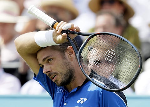 Stanislas Wawrinka during the Queen's Club tournament match against Sam Querrey. (AP)