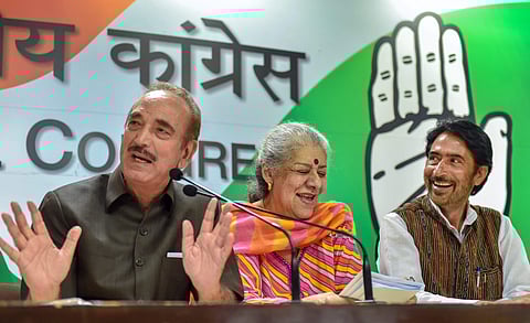 Senior Congress leaders Ghulam Nabi Azad speaks as Ambika Soni and J K Congress President Ghulam Ahmed Mir look on during a press conference at AICC Headquarters in New Delhi Wednesday June 20 2018. | PTI
