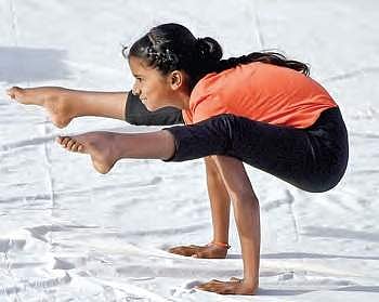 A schoolgirl performs during Yoga day celebrations in Hyderabad | Vinay Madapu
