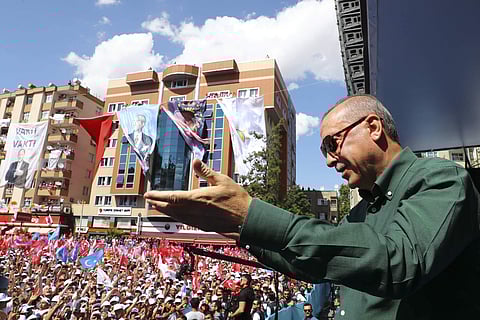 In this photo taken Thursday, June 21, 2018, Turkey's President Recep Tayyip Erdogan, addresses supporters of his ruling Justice and Development Party (AKP) during an election rally in Gaziantep, eastern Turkey. | AP