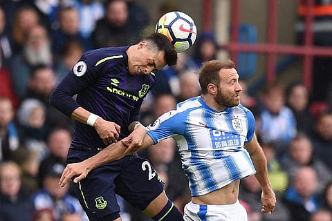 Everton's Argentinian defender Ramiro Funes Mori (L). | AFP File Photo