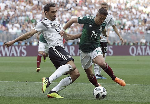Germany's Mats Hummels, left, and Mexico's Javier Hernandez challenge for the ball during the FIFA World Cup 2018 group F match between Germany and Mexico. (File | AP)