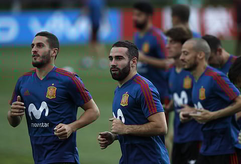 Spain's Dani Carvajal , center, and Koke practice during a training session of Spain at the 2018 soccer World Cup in Krasnodar. | AP