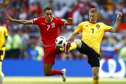 Belgium's Kevin De Bruyne, right, and Tunisia's Saifeddine Khaoui challenge for the ball during the group G match between Belgium and Tunisia at the 2018 soccer World Cup in the Spartak Stadium in Moscow, Russia. | AP