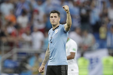 Uruguay's Jose Gimenez celebrates at the end of the group A match between Uruguay and Saudi Arabia at the 2018 soccer World Cup in Rostov Arena in Rostov-on-Don, Russia, Wednesday, June 20, 2018. | AP