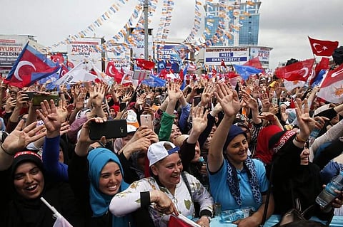 Supporters wave during an election rally of Turkey's President Recep Tayyip Erdogan and his ruling Justice and Development Party. | AP
