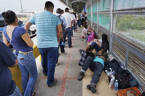Migrant families waiting to seek asylum in U.S. | AP