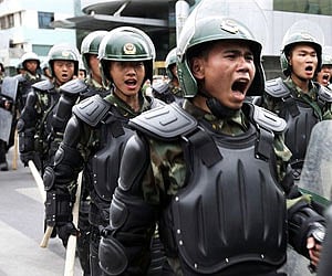 Chinese paramilitary police patrol in Urumqi, western China's Xinjiang province. (File | AP)