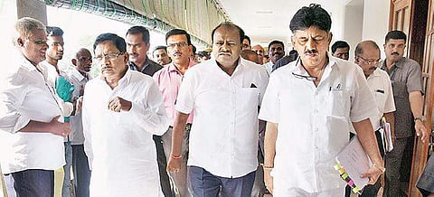 DyCM Dr G Parameshwara, Chief Minister H D Kumaraswamy and Irrigation Minister D K Shivakumar arrive for a meeting on Cauvery Water Management Authority, at Vidhana Soudha in Bengaluru on Monday | Vinod kumar T