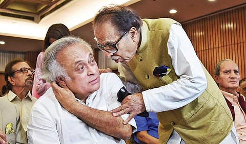 Congress leader Saifuddin Soz speaks to party colleague Jairam Ramesh during the launch of his book ‘Kashmir: Glimpses of history and the story of struggle’ in New Delhi on Monday. (EPS | Parveen Negi)
