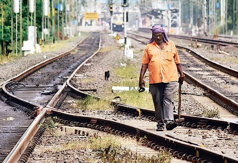 A trackman inspects the track near Kodambakkam station | ashwin prasath